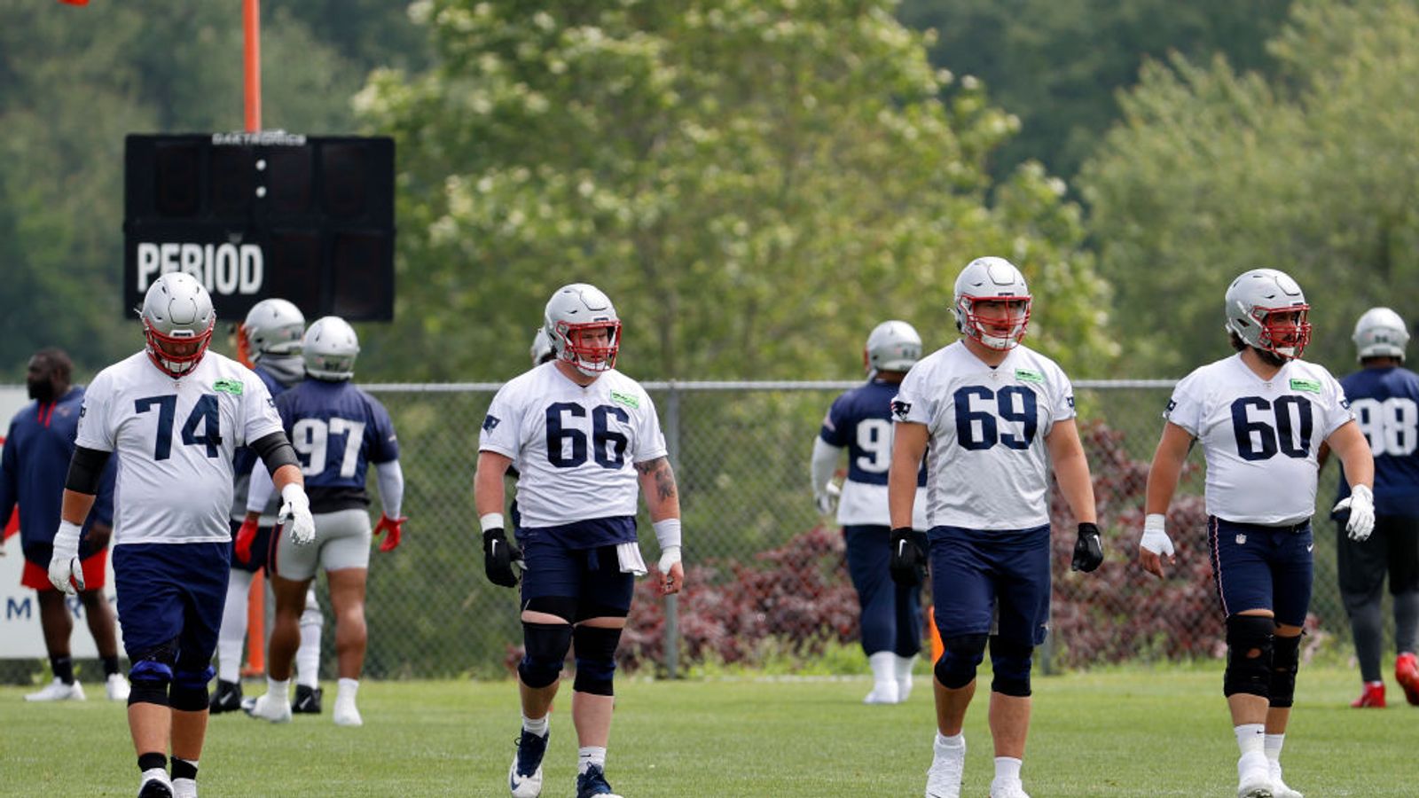 New England Patriots center David Andrews (60) walks off the field