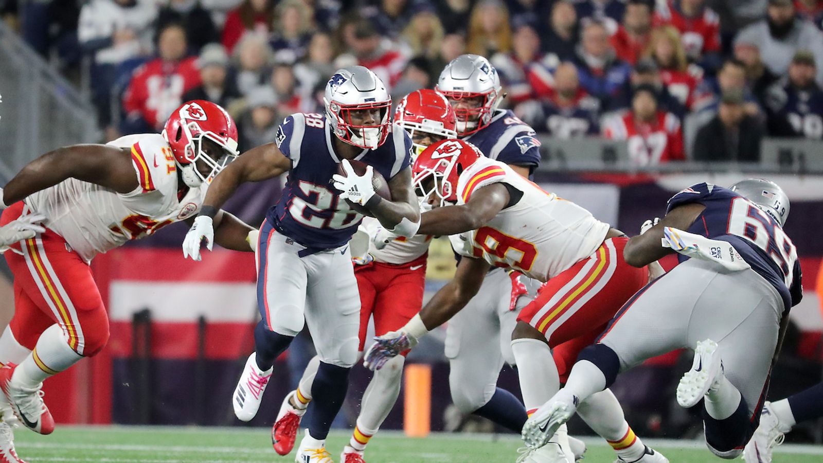 Offensive lineman John Hannah of the New England Patriots blocks