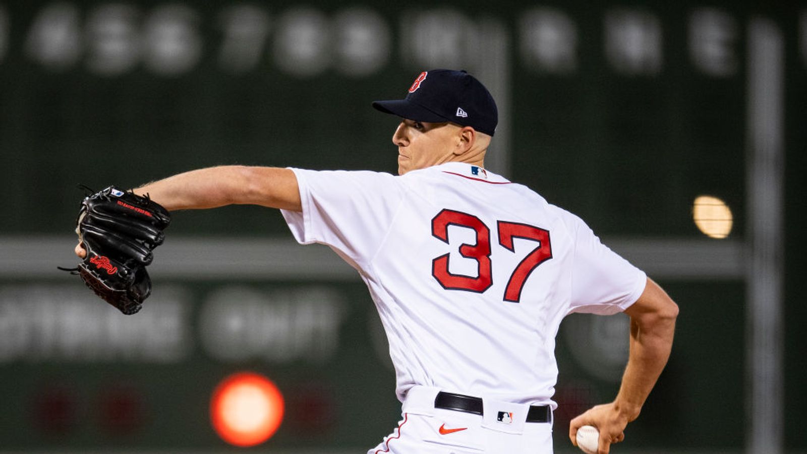 Red Sox player' Carl Yastrzemski throws a first pitch to his 29